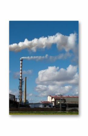 Industrial factories emitting toxic smoke, industrial waste into the environment, air pollution
