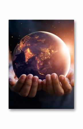 Earth at night was holding in human hands. Earth day. Energy saving concept, Elements of this image furnished by NASA