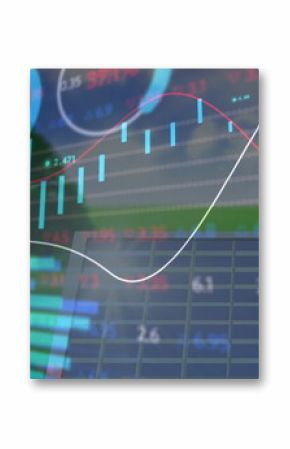 Image of financial data and graphs over solar panels