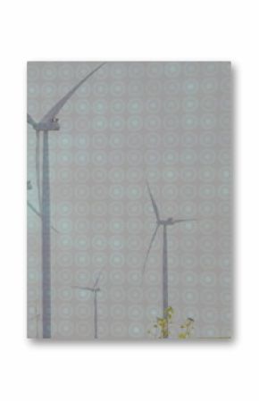 Spinning wind turbines generating electricity on grassy plain under overcast sky, with low shrubs