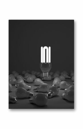 Composite image of lit energy efficient lightbulb over bulbs