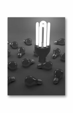 High angle view of lit energy efficient lightbulb over bulbs