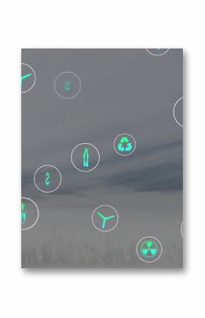 Floating teal-and-white circular icons drifting above city skyline, with energy and finance symbols