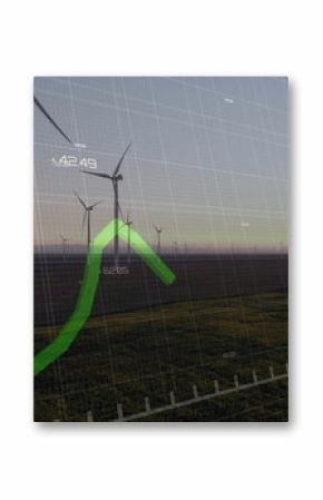 Wind turbines standing on plain at dawn, with translucent grid overlay and green line graph markers