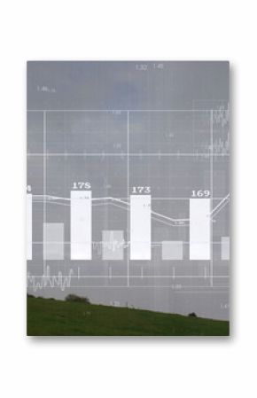 Wind turbine rotating in rural grassy hillside, with shrubs and bar chart overlay, copy space