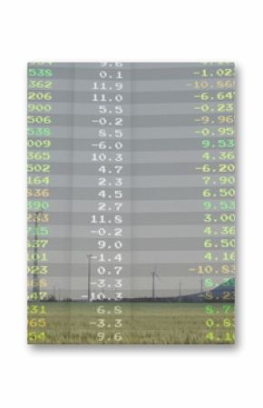Showing wind turbines standing on rural farmland, with overlaid colored data codes and smokestacks
