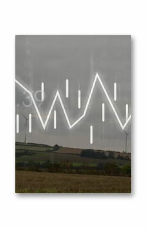 Displaying white candlestick chart hovering over harvested farmland, wind turbines and rural houses