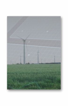 Rotating white wind turbine over grassy field near mountain ridge, with digital globe grid overlay