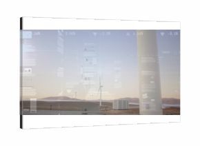 Showing turbine tower base with container displaying data overlays at wind farm at dusk, copy space