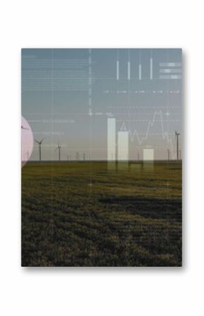 Rotating wind turbine producing power on grassy plain at dusk, with digital data graphs