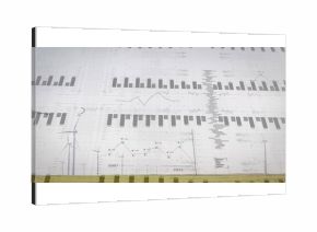 Composite data visualization overlaying rural energy site, with wind turbines, grid and charts