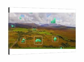 Floating eco icons over rural farmland, with CO2, electric car, oil rig and energy symbols