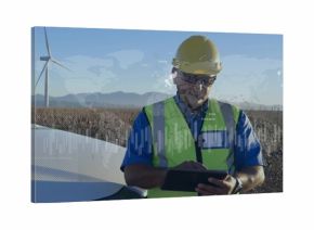 Holding tablet technician in yellow hardhat hivis vest monitoring at wind farm near white vehicle