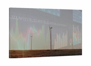 Displaying prominent wind turbine tower standing on flat plain at sunset, with guardrail and data
