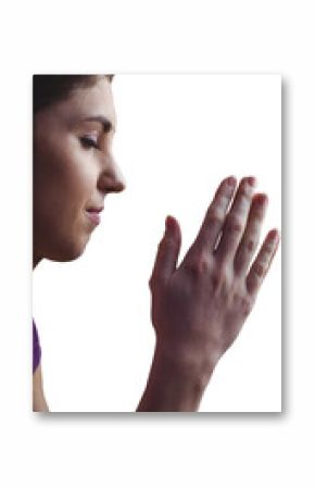 Woman praying with hands together