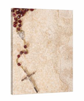 rosary beads on stone with copy space