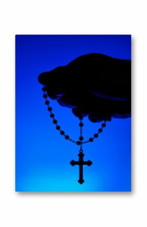 hand holding rosary