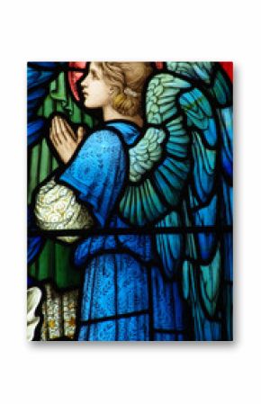 Praying angel in a stained glass window