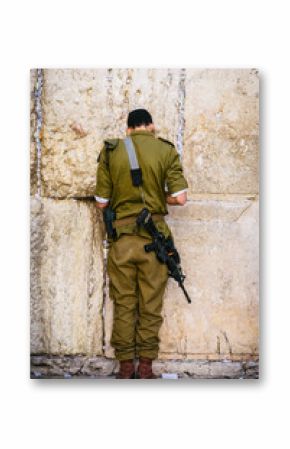 Israeli soldier on Western Wall in Jerusalem, Israel