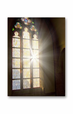Church stained-glass window with light shining through