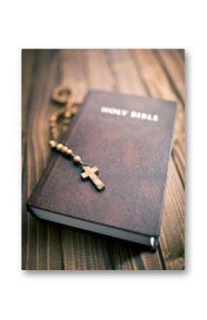 holy bible with rosary beads