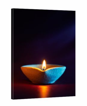 Traditional clay diya lamps lit during diwali celebration