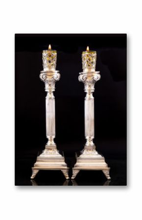 Shabbat candles. Silver candlesticks with olive oil