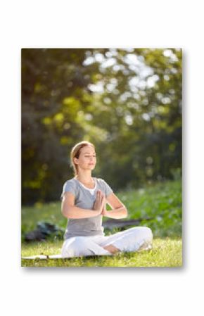 Female in nature practicing yoga