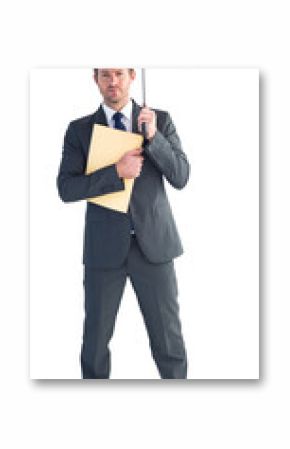 Businessman sheltering under umbrella holding file