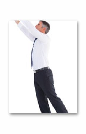 Businessman with hands raised over white background