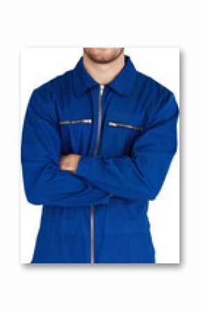 Smiling mechanic in boiler suit with folded arms