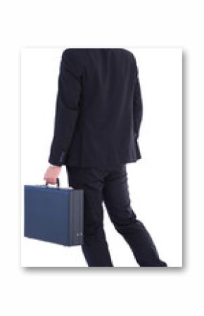Businessman walking while holding briefcase 