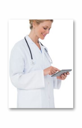 Blonde doctor using tablet pc