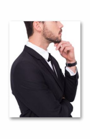 Thoughtful businessman touching his chin