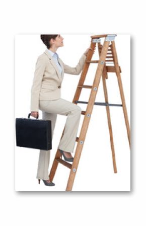 Businesswoman climbing career ladder with briefcase