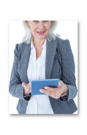 Portrait of confident businesswoman using digital tablet