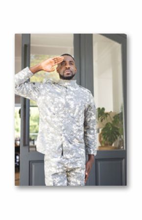African American soldier in military uniform salutes respectfully