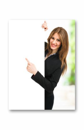 Business woman pointing her finger to a white board