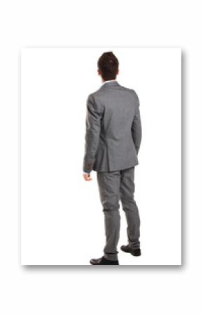 business man from the back - looking at something over a white 