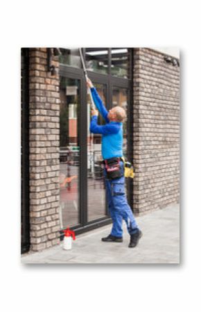 window washer working  at building outdoor