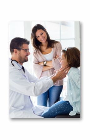 Mother with her daughter having throat examination by pediatrician in the office.