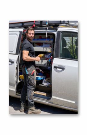 Small business Electrician preparing work van