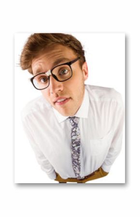 Young geeky businessman looking at camera