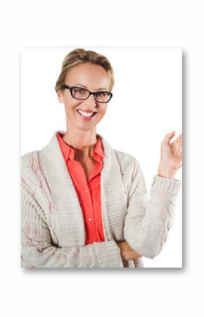 Businesswoman smiling while pointing finger