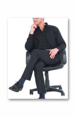 Thoughtful businessman sitting on a swivel chair