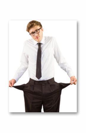 Geeky businessman showing his empty pockets