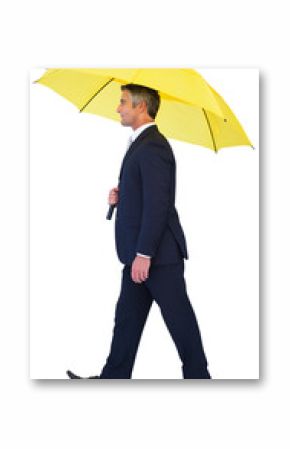 Businessman with yellow umbrella walking on white background