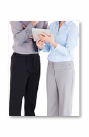 Business people discussing over tablet computer