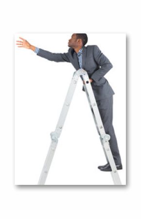 Businessman climbing up ladder