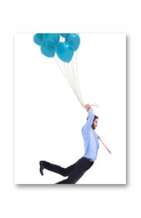 Digital png photo of caucasian businessman holding balloons and flying on transparent background